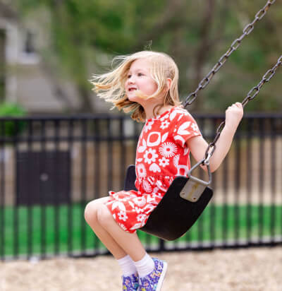 LeafSpring School student on swing